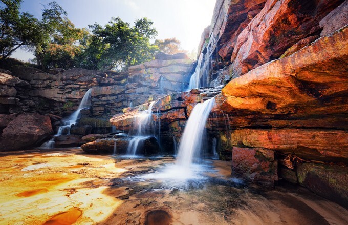 Waterfall and mountain landscape, Fresh water river stream flowing through beautiful rocky canyon